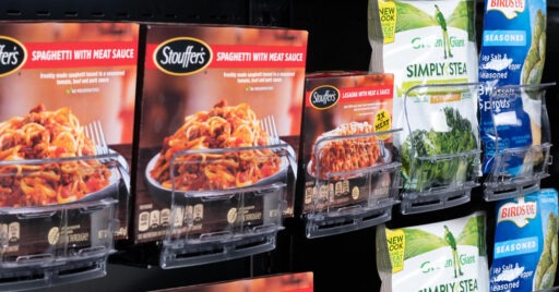 frozen dinners at a grocery store displayed using a Retail Space Solutions pusher tray