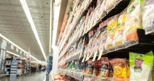 cheese slices in Retail Space Solutions pusher trays at a grocery store