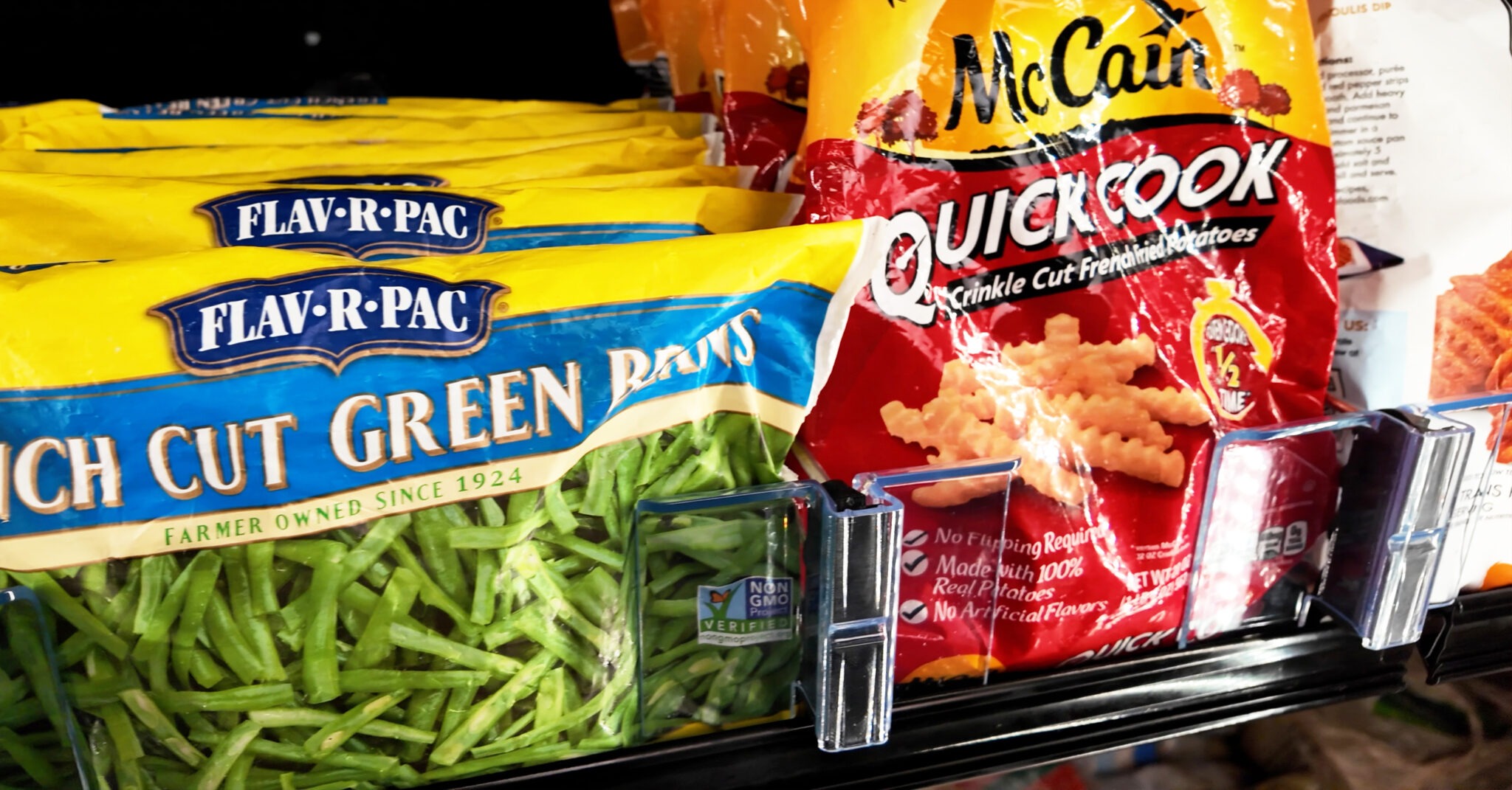 frozen green beans in a pusher tray